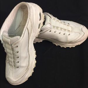 Sketcher D’Lites shoes. Leather/synthetic upper